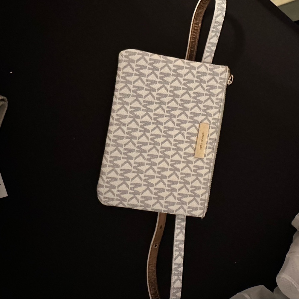 Michael Kors Stylish White Patterned Waist-Belted Bag belt is 33”